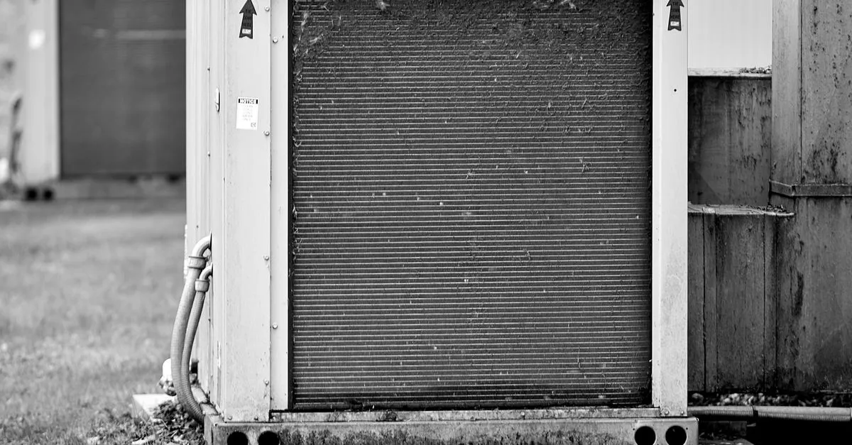 A high-efficiency HVAC unit installed outdoors, the kind of system replacement an HVAC website is built to sell and finance.