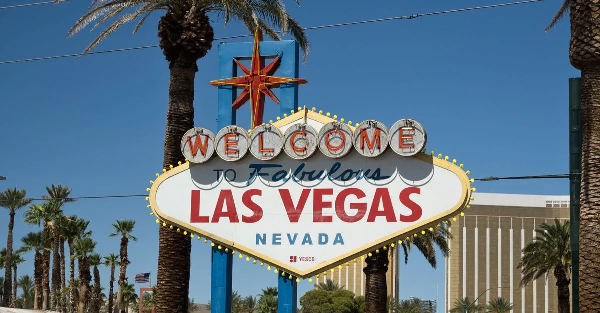 The iconic Welcome to Fabulous Las Vegas sign in bright sunlight, a symbol of the tourist market local businesses compete for.