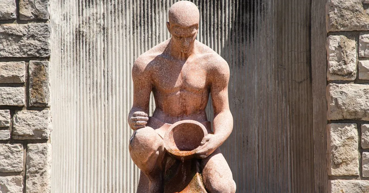 A stone statue in Loose Park near the Country Club Plaza in Kansas City, Missouri.