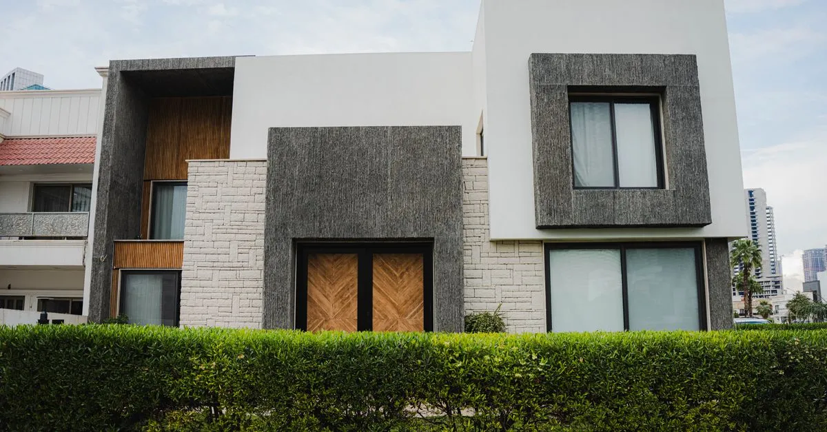 A finished modern custom home exterior, the kind of completed build a home builder showcases to buyers.