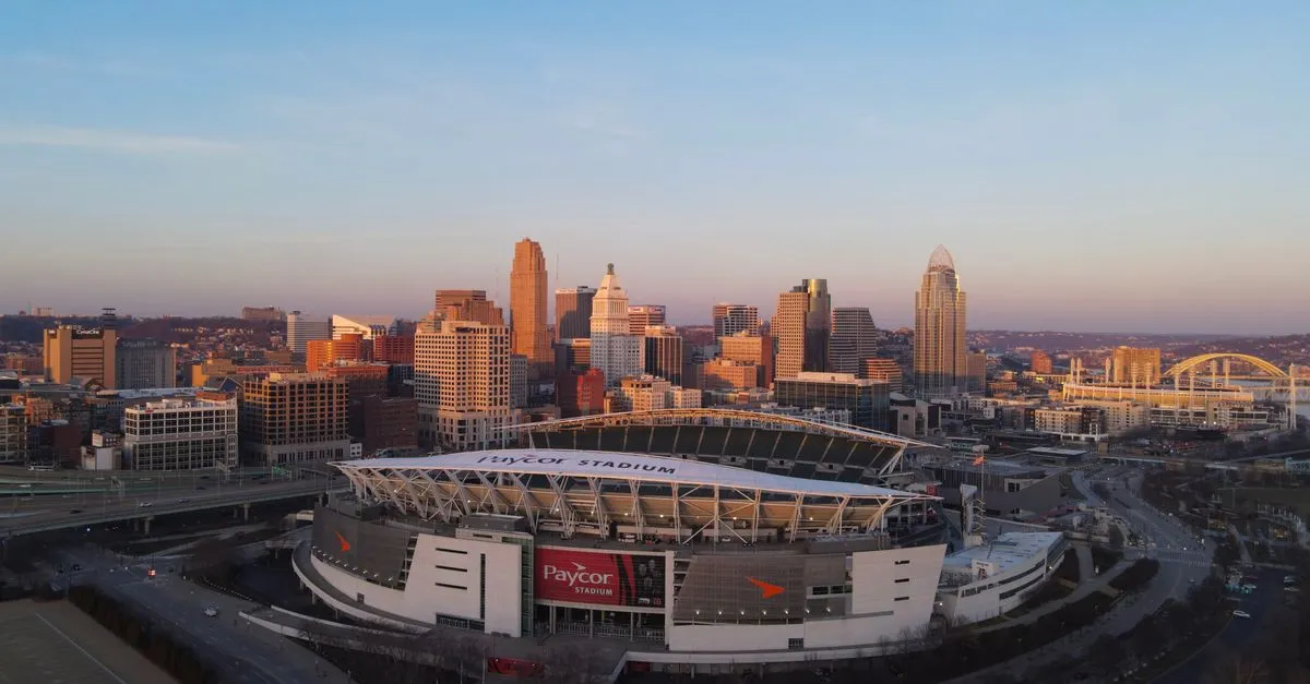 Paycor Stadium on the Cincinnati riverfront at sunset with the downtown skyline behind it, the kind of local market local SEO is built for.