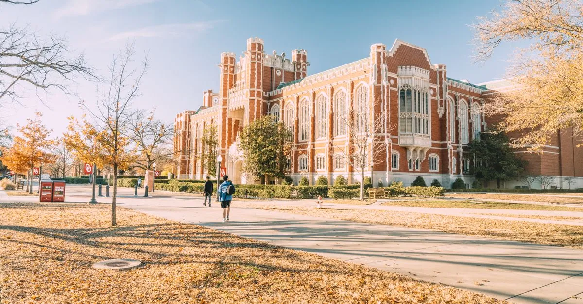 A historic university campus building in autumn, the kind of college prospective students research before they apply.