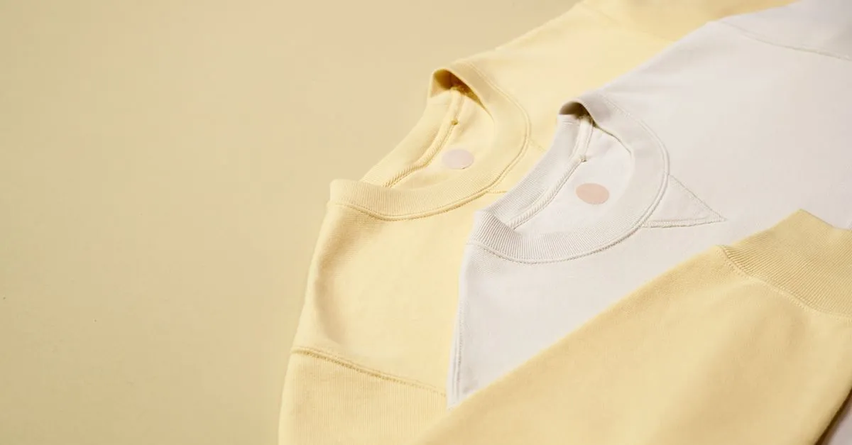A flat lay of pastel apparel styled the way a fashion brand shoots for lookbooks and product pages.