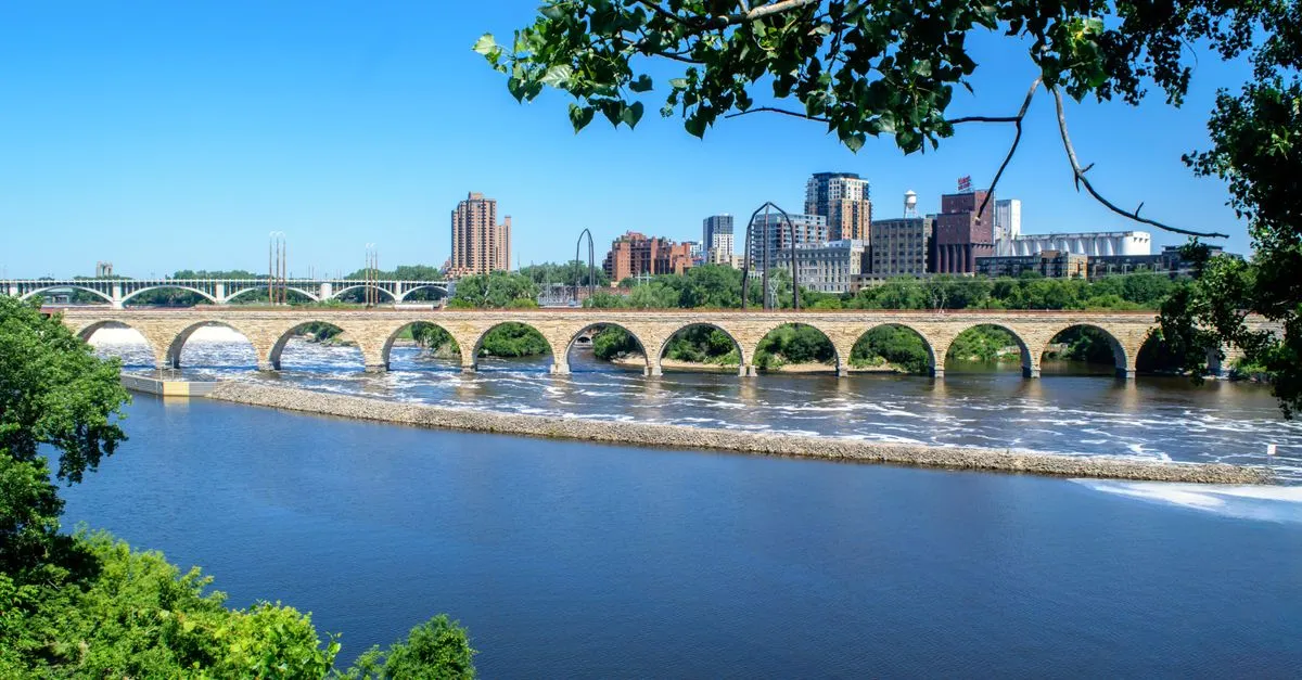 The Stone Arch Bridge spanning the Mississippi River below the St. Anthony Falls milling district in Minneapolis.
