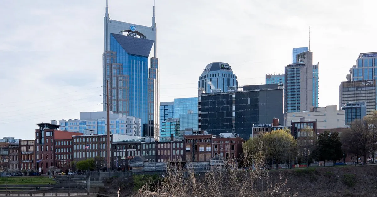Downtown Nashville, Tennessee skyline with the AT&T tower rising over Broadway.