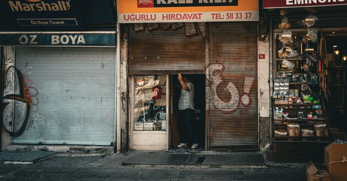 A row of local shops on a busy street, where customers find businesses through local search.