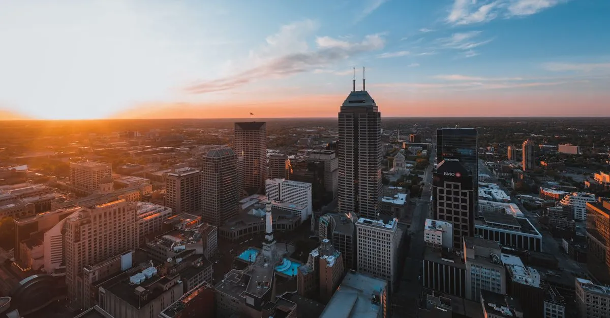 Aerial sunset view of the Indianapolis skyline with the Salesforce Tower and the Soldiers and Sailors Monument, the metro where the local map pack is won.