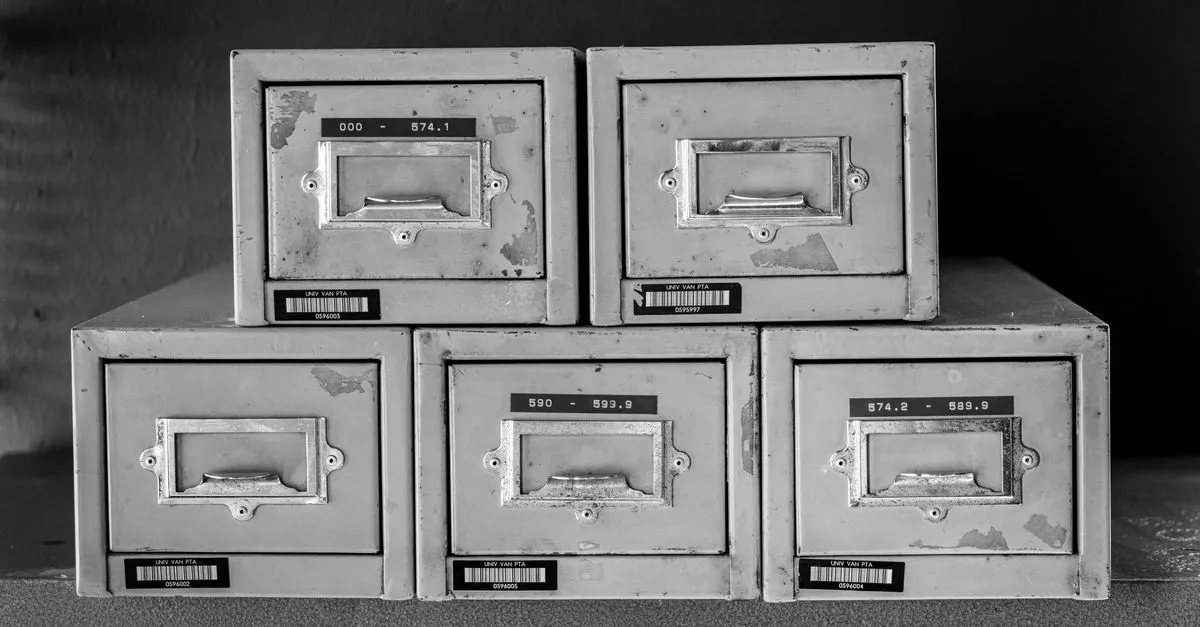 A row of vintage metal file cabinets, standing in for the pile of pages a content audit sorts through.