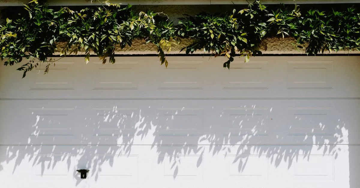 A closed white sectional residential garage door, the kind a garage door company gets found for through local SEO.