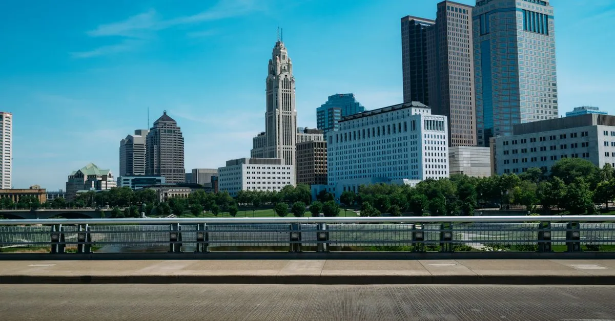 Downtown Columbus, Ohio skyline with the LeVeque Tower rising over the Scioto Mile riverfront.