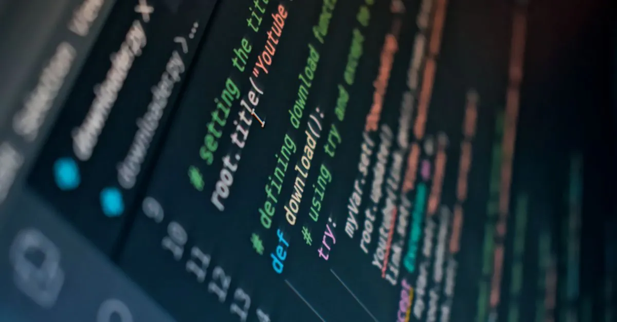 Close-up of code on a screen, the technical foundation search engines crawl and index.