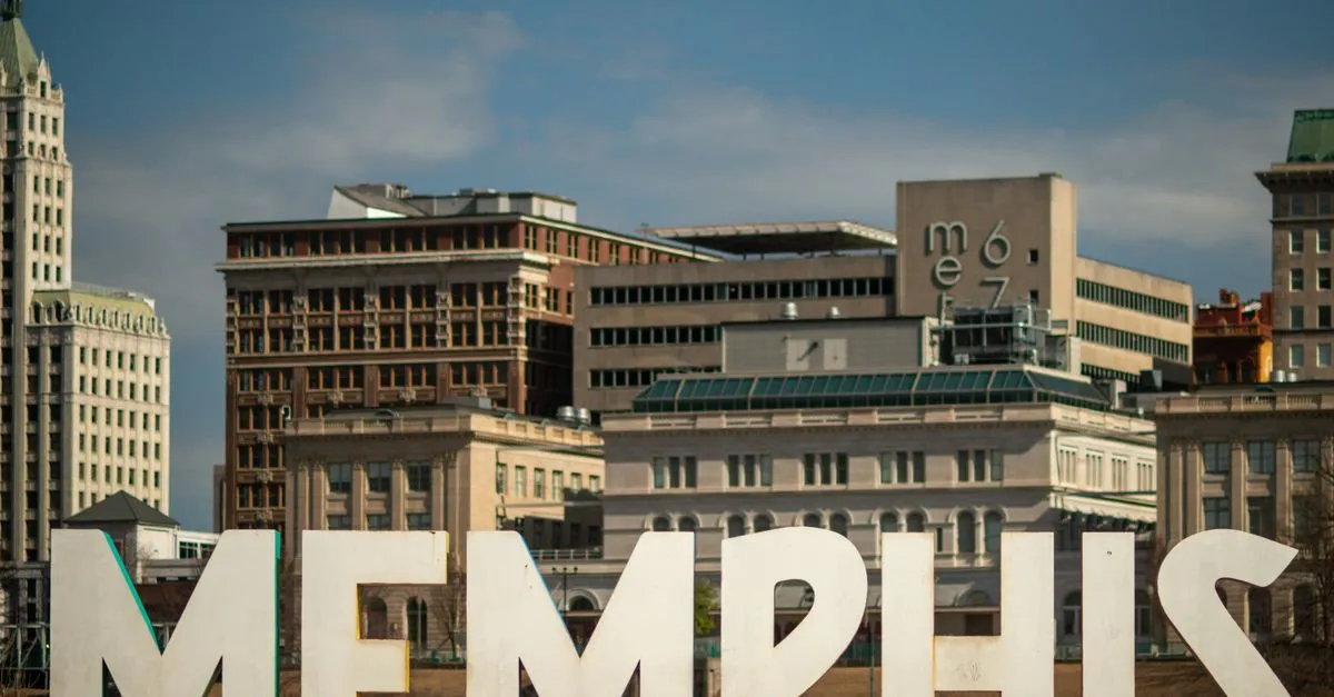 The iconic Memphis sign lit up against the downtown skyline, where local businesses compete for attention online.