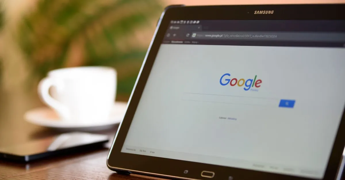 A tablet on a Google page, where AI Overviews now appear at the top of results.
