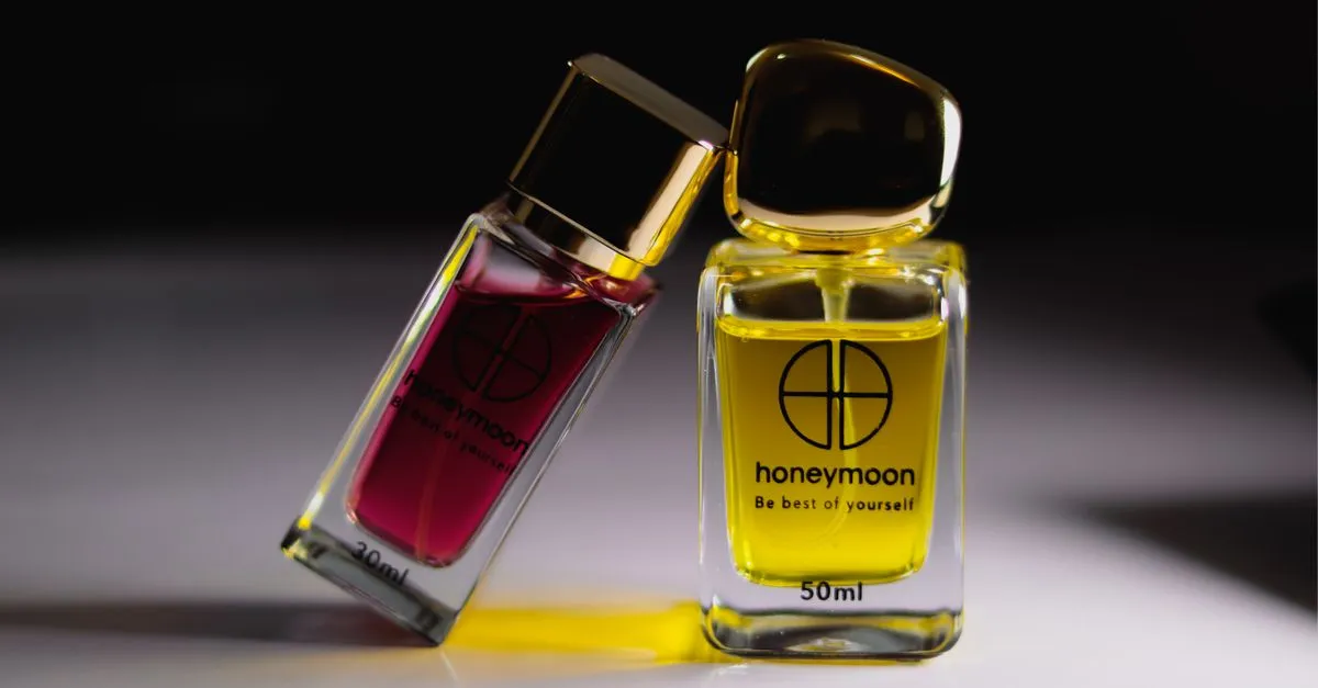 Close-up studio product shot of perfume bottles, the kind of clean product detail AI engines can parse.