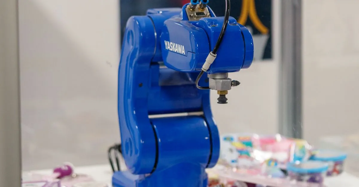 An industrial robot arm, a stand-in for the AI engines your content needs to satisfy.