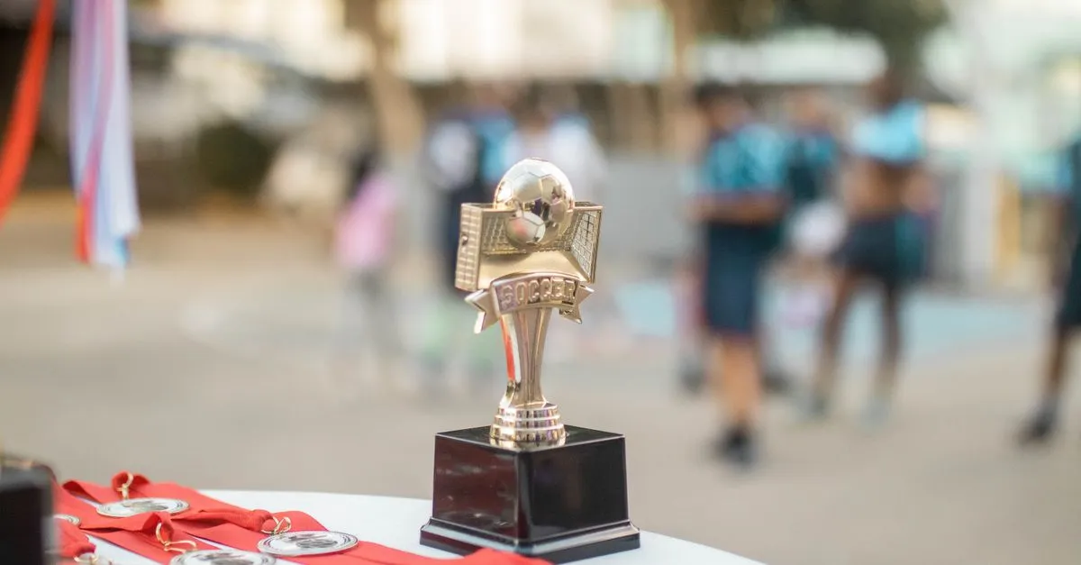A trophy at an award ceremony, standing in for the authority signals that build trust.